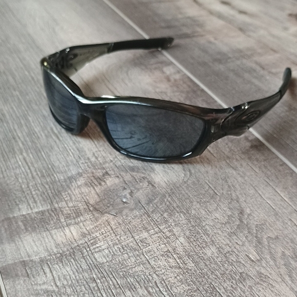 Oakley Straight Glossy Black Sunglasses with Dark Tint - Picture 1 of 11